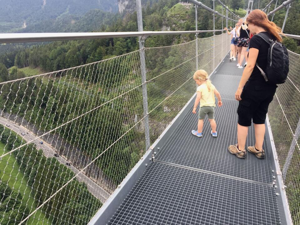 Zoe and Nicole on a swing bridge.