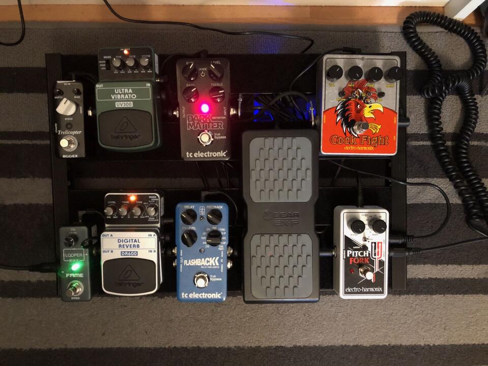 A top-down photo of the new two-rowed pedal board, featuring eight pedals and an expression pedal.